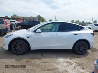 2021 Tesla Model Y Performance z VIN 5YJYGDEF7MF277769, wystawiony jako IAAI lot #42025157 z przebiegiem 28 522 mil mil oraz . Historia ofert i sprzedaży dostępna na DreamBid. Obrazek 13.