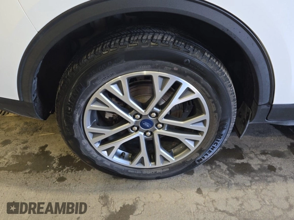 2021 Ford Escape SEL Hybrid with VIN 1FMCU9CZ1MUB25597, listed as a IAAI auction lot 42663573 with 79,061 mi miles and . Bid and sale history available at DreamBid. Image 14.