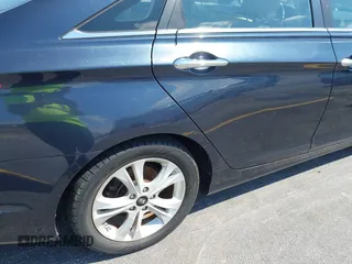 2013 Hyundai Sonata Limited with VIN 5NPEC4AC6DH541950, listed as a IAAI auction lot 41805171 with 162,706 mi miles and . Bid and sale history available at carsss.com. Image 14.