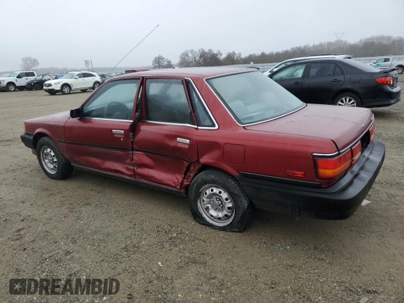 1990 Toyota Camry z VIN JT2SV24E4L3422585, wystawiony jako Copart lot #84872844 z przebiegiem 119 987 mil mil oraz Szkoda całkowita • Salvage title. Historia ofert i sprzedaży dostępna na DreamBid. Obrazek 2.