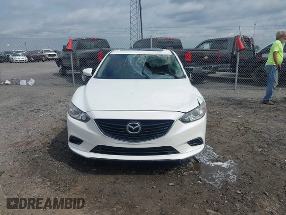 2016 Mazda Mazda6 i Touring with VIN JM1GJ1V56G1448334, listed as a IAAI auction lot 42075222 with 52,883 mi miles. Bid and sale history available at carsss.com. Image 12.