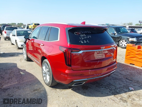 2021 Cadillac XT6 Premium Luxury z VIN 1GYKPCRS1MZ114854, wystawiony jako IAAI lot #41205686 z przebiegiem 27 347 mil mil oraz . Historia ofert i sprzedaży dostępna na DreamBid. Obrazek 3.