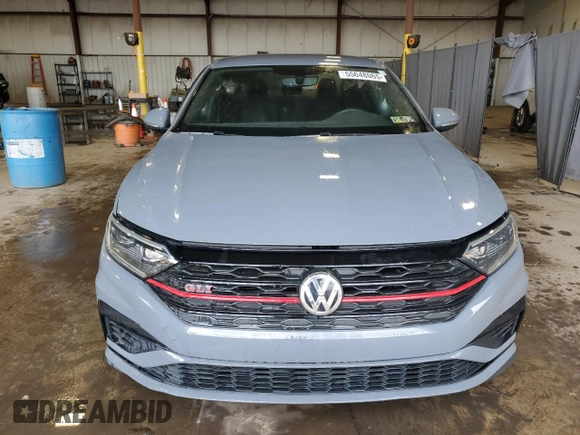 2021 Volkswagen Jetta GLI S с VIN 3VW6T7BU6MM046720, выставлен на аукционе Copart как лот 55648065 с пробегом 56 962 миль миль и Списание • Salvage title. История ставок и продаж доступна на DreamBid. Изображение 5.