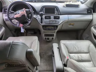 2005 Honda Odyssey Touring z VIN 5FNRL38855B051447, wystawiony jako Copart lot #57144925 z przebiegiem 186 476 mil mil oraz Szkoda całkowita • Salvage title. Historia ofert i sprzedaży dostępna na DreamBid. Obrazek 8.