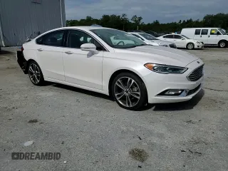 2017 Ford Fusion Titanium с VIN 3FA6P0K96HR161679, выставлен на аукционе Copart как лот 61237935 с пробегом 66 680 миль миль и Списание • Salvage title. История ставок и продаж доступна на DreamBid. Изображение 13.