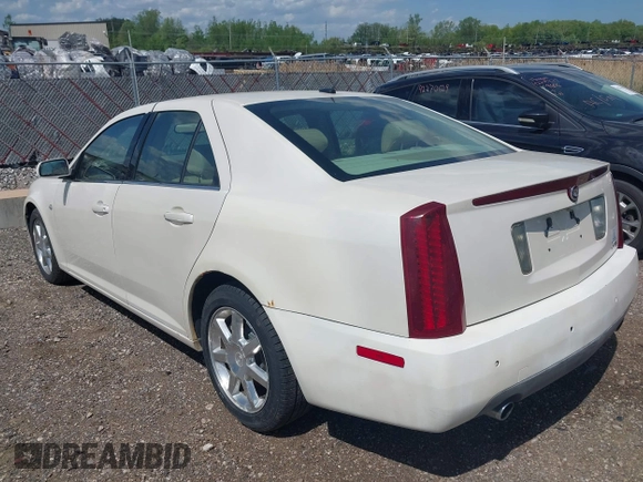 2005 Cadillac STS z VIN 1G6DW677750171537, wystawiony jako IAAI lot #42270330 z przebiegiem 126 889 mil mil oraz . Historia ofert i sprzedaży dostępna na DreamBid. Obrazek 3.