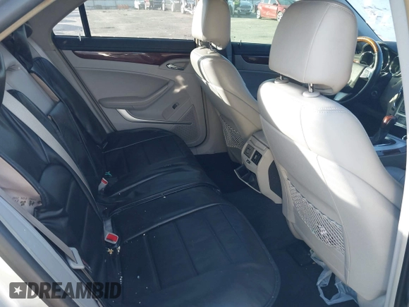 2010 Cadillac CTS Luxury with VIN 1G6DE5EG6A0111713, listed as a IAAI auction lot 41151719 with 138,277 mi miles and . Bid and sale history available at DreamBid. Image 8.