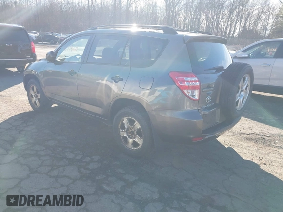 2010 Toyota RAV4 with VIN JTMBF4DV0A5031581, listed as a IAAI auction lot 41714611 with 186,814 mi miles. Bid and sale history available at carsss.com. Image 3.