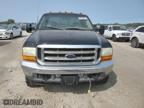 2001 Ford F-350 XL with VIN 1FTSX31F11ED72055, listed as a Copart auction lot 66164624 with 228,597 mi miles and Salvage Title. Bid and sale history available at DreamBid. Image 5.