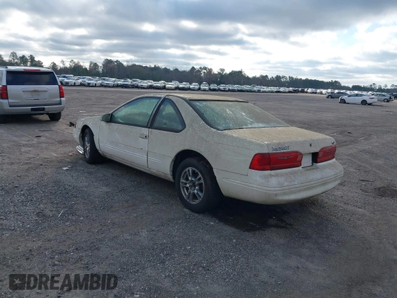 1996 Ford Thunderbird LX z VIN 1FALP62W4TH154400, wystawiony jako IAAI lot #41394723 z przebiegiem 65 860 mil mil oraz . Historia ofert i sprzedaży dostępna na DreamBid. Obrazek 3.
