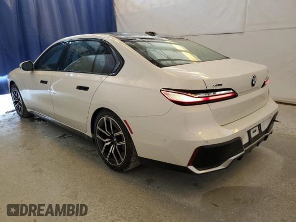 2024 BMW 7 Series 740i xDrive with VIN WBA33EH05RCR68996, listed as a Copart auction lot 73118674 with 14,266 mi miles and Salvage Title. Bid and sale history available at carsss.com. Image 2.