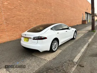 2019 Tesla Model S 75D with VIN 5YJSA1E28KF333962, listed as a Copart auction lot 54815975 with 21,203 mi miles and Salvage title. Bid and sale history available at DreamBid. Image 4.