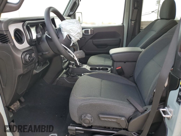 2024 Jeep Wrangler Sport S with VIN 1C4PJXAG2RW335190, listed as a Copart auction lot 51767465 with 2,717 mi miles and Salvage title. Bid and sale history available at DreamBid. Image 7.