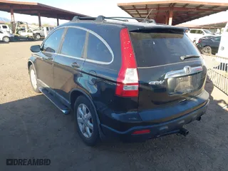 2009 Honda CR-V EX-L with VIN 5J6RE38769L018276, listed as a IAAI auction lot 41690588 with 152,784 mi miles. Bid and sale history available at carsss.com. Image 3.