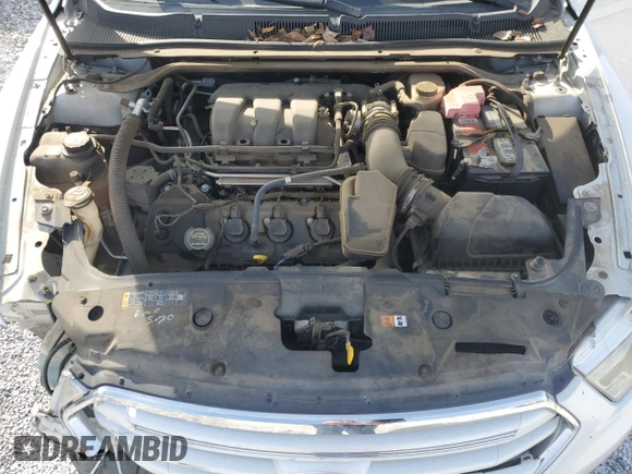2015 Ford Taurus Limited with VIN 1FAHP2F86FG125680, listed as a Copart auction lot 42934535 with 122,156 mi miles and Salvage Title. Bid and sale history available at DreamBid. Image 12.