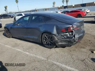 2017 Tesla Model S 100D с VIN 5YJSA1E23HF199497, выставлен на аукционе Copart как лот 51302475 с пробегом 61 993 миль миль и Списание • Salvage title. История ставок и продаж доступна на DreamBid. Изображение 2.