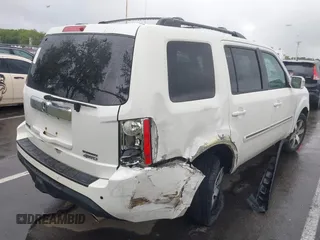 2013 Honda Pilot Touring with VIN 5FNYF4H96DB016044, listed as a IAAI auction lot 42314590 with 183,913 mi miles and . Bid and sale history available at DreamBid. Image 4.
