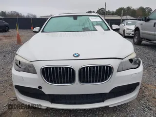 2014 BMW 7 Series 740i with VIN WBAYA6C51ED144387, listed as a IAAI auction lot 41226638 with 161,448 mi miles. Bid and sale history available at carsss.com. Image 12.