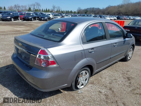 2011 Chevrolet Aveo 1LT z VIN KL1TD5DE5BB147997, wystawiony jako IAAI lot #39010016 z przebiegiem 111 680 mil mil oraz . Historia ofert i sprzedaży dostępna na DreamBid. Obrazek 4.