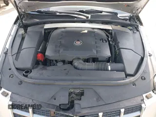2012 Cadillac CTS Performance z VIN 1G6DJ5E37C0145221, wystawiony jako IAAI lot #42111935 z przebiegiem 82 103 mil mil oraz . Historia ofert i sprzedaży dostępna na DreamBid. Obrazek 10.