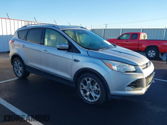 2014 Ford Escape Titanium with VIN 1FMCU9J94EUD01966, listed as a IAAI auction lot 41226043 with 132,730 mi miles. Bid and sale history available at carsss.com. Image 1.