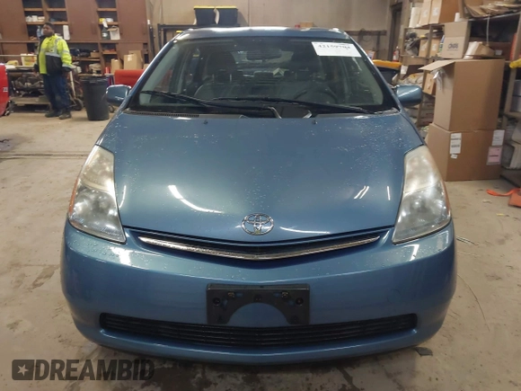 2007 Toyota Prius with VIN JTDKB20U877089190, listed as a IAAI auction lot 42159704 with 140,327 mi miles and . Bid and sale history available at DreamBid. Image 6.