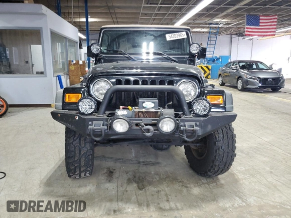 2001 Jeep Wrangler Sport with VIN 1J4FA49S31P331578, listed as a Copart auction lot 54302965 with 102,550 mi miles and Clean Title. Bid and sale history available at carsss.com. Image 5.