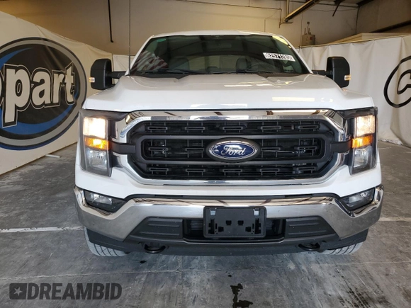2023 Ford F-150 XL with VIN 1FTFW1EDXPFA77220, listed as a Copart auction lot 62571285 with 90,277 mi miles and Clean title. Bid and sale history available at DreamBid. Image 5.