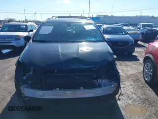 2018 Chrysler Pacifica Touring L with VIN 2C4RC1BGXJR157184, listed as a IAAI auction lot 41803388 with 102,095 mi miles and . Bid and sale history available at DreamBid. Image 12.