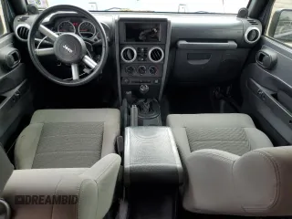 2008 Jeep Wrangler Unlimited Sahara with VIN 1J4GA59108L562831, listed as a Copart auction lot 58949225 with 206,312 mi miles and Clean title. Bid and sale history available at DreamBid. Image 8.