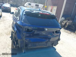 2017 BMW X1 xDrive28i with VIN WBXHT3C33H5F82035, listed as a IAAI auction lot 41944399 with 102,942 mi miles. Bid and sale history available at carsss.com. Image 6.