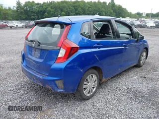 2015 Honda Fit LX with VIN 3HGGK5G59FM711808, listed as a IAAI auction lot 42655848 with 169,780 mi miles and . Bid and sale history available at DreamBid. Image 4.