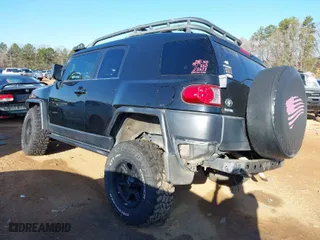 2008 Toyota FJ Cruiser with VIN JTEBU11F78K012714, listed as a IAAI auction lot 41524428 with 209,130 mi miles. Bid and sale history available at carsss.com. Image 3.