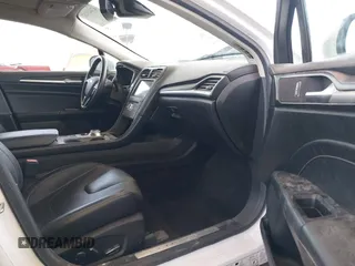 2017 Ford Fusion Hybrid Titanium with VIN 3FA6P0RU8HR229653, listed as a IAAI auction lot 42445182 with 163,279 mi miles and . Bid and sale history available at DreamBid. Image 5.