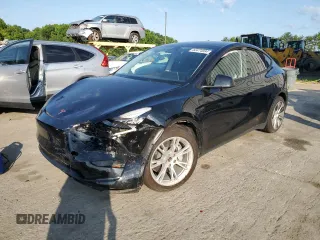 2022 Tesla Model Y Long Range z VIN 7SAYGAEE7NF576382, wystawiony jako Copart lot #63474884 z przebiegiem Nie podano mil oraz Szkoda całkowita • Salvage title. Historia ofert i sprzedaży dostępna na DreamBid. Obrazek 1.
