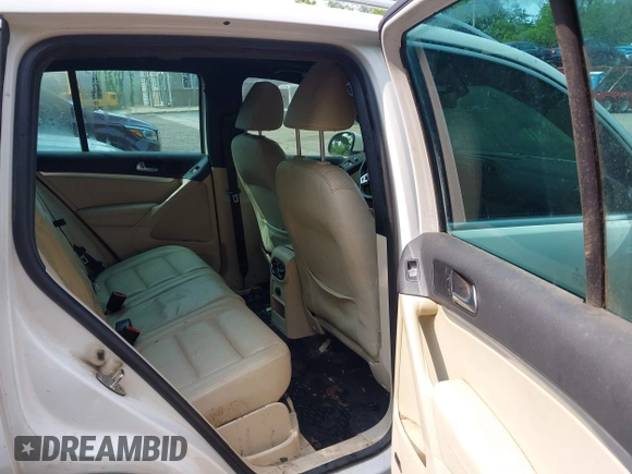 2014 Volkswagen Tiguan SEL with VIN WVGAV3AX7EW022239, listed as a IAAI auction lot 42381670 with 180,729 mi miles and . Bid and sale history available at DreamBid. Image 8.