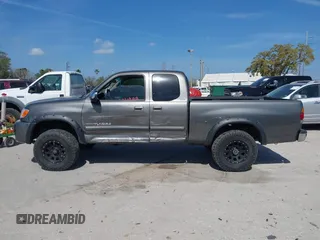 2003 Toyota Tundra SR5 with VIN 5TBBT44183S405902, listed as a IAAI auction lot 41704999 with 220,777 mi miles and . Bid and sale history available at DreamBid. Image 14.