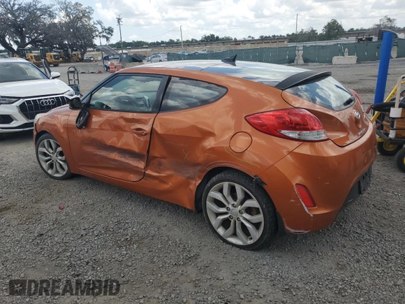 2013 Hyundai Veloster w/Red Int with VIN KMHTC6AD5DU094010, listed as a Copart auction lot 58048795 with 90,455 mi miles and Salvage title. Bid and sale history available at DreamBid. Image 2.