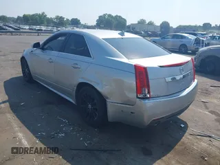 2012 Cadillac CTS with VIN 1G6DC5E51C0156873, listed as a IAAI auction lot 42587421 with 169,006 mi miles and . Bid and sale history available at DreamBid. Image 3.