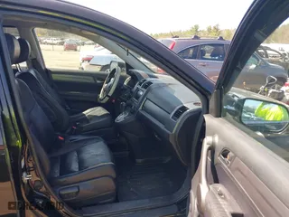 2009 Honda CR-V EX-L with VIN JHLRE48799C012129, listed as a IAAI auction lot 42016110 with 141,819 mi miles. Bid and sale history available at carsss.com. Image 5.