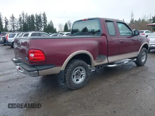 1997 Ford F-150 z VIN 2FTDX08W1VCA04449, wystawiony jako IAAI lot #41858712 z przebiegiem 223 304 mil mil oraz . Historia ofert i sprzedaży dostępna na DreamBid. Obrazek 4.