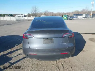 2023 Tesla Model Y Long Range with VIN 7SAYGDEE8PA140562, listed as a IAAI auction lot 41837231 with 30,847 mi miles. Bid and sale history available at carsss.com. Image 17.