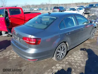 2017 Volkswagen Jetta 1.4T SE with VIN 3VWB67AJ7HM299130, listed as a IAAI auction lot 41572406 with 115,898 mi miles. Bid and sale history available at carsss.com. Image 4.
