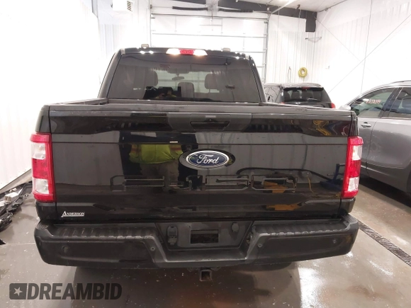 2021 Ford F-150 XL with VIN 1FTFW1E51MFD11166, listed as a IAAI auction lot 41883197 with 33,303 mi miles. Bid and sale history available at carsss.com. Image 17.
