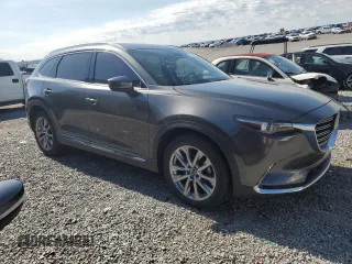 2017 Mazda CX-9 Grand Touring with VIN JM3TCADY0H0130082, listed as a Copart auction lot 56464384 with 115,078 mi miles and Salvage title. Bid and sale history available at DreamBid. Image 4.