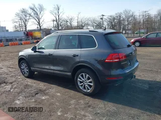 2014 Volkswagen Touareg Sport z VIN WVGEF9BP9ED010718, wystawiony jako IAAI lot #41786403 z przebiegiem 149 569 mil mil oraz . Historia ofert i sprzedaży dostępna na DreamBid. Obrazek 14.