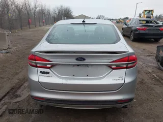 2018 Ford Fusion SE z VIN 3FA6P0LU3JR141401, wystawiony jako IAAI lot #41718444 z przebiegiem Nie podano mil oraz . Historia ofert i sprzedaży dostępna na DreamBid. Obrazek 17.
