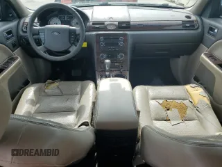 2008 Ford Taurus Limited with VIN 1FAHP25W78G128851, listed as a Copart auction lot 61254015 with 216,335 mi miles and Salvage title. Bid and sale history available at DreamBid. Image 8.