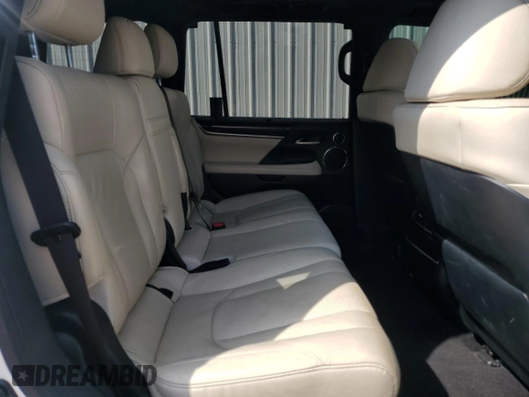 2020 Lexus LX 570 with VIN JTJDY7AX6L4332372, listed as a Copart auction lot 57315675 with 132,418 mi miles and Salvage title. Bid and sale history available at DreamBid. Image 11.