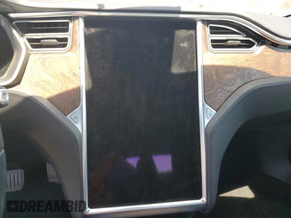 2017 Tesla Model S 100D с VIN 5YJSA1E28HF213023, выставлен на аукционе Copart как лот 50136795 с пробегом Не указан миль и Списание • Salvage title. История ставок и продаж доступна на DreamBid. Изображение 9.